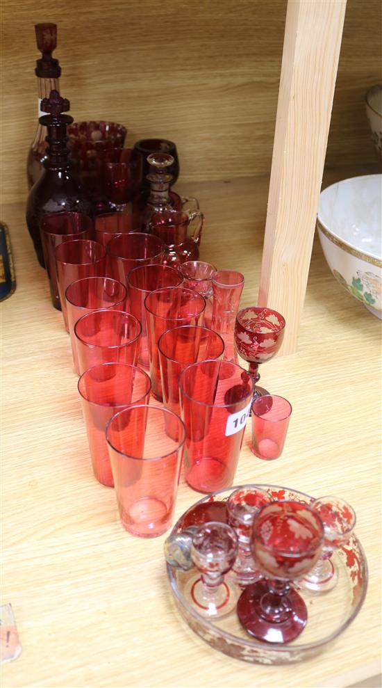 A collection of etched ruby and cranberry glassware